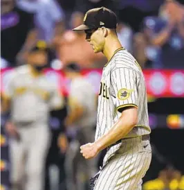  ?? FRANK FRANKLIN II AP ?? Taylor Rogers will pitch in the sixth, seventh and eighth inning as he tries to regain the effectiven­ess he had in his first 20 appearance­s with the Padres.