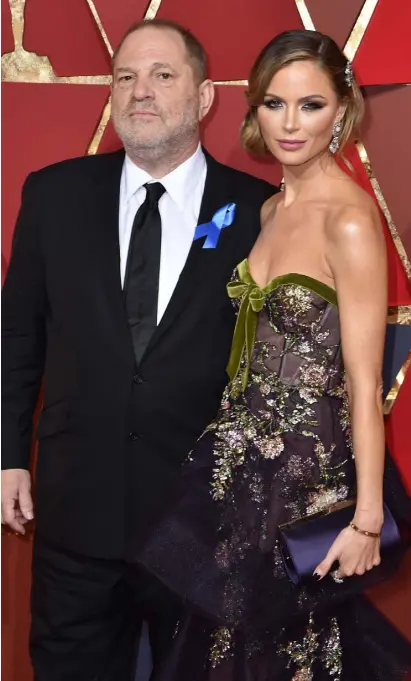  ??  ?? CONTROVERS­Y: Hollywood producer Harvey Weinstein, pictured with wife Georgina Chapman, stands accused of sexual harassment against several actresses