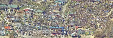  ?? ?? Damage caused by super typhoon Rai after the storm crossed over Surigao City in Surigao del Norte province.