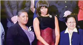  ?? ABC NETWORK NEWS ?? Cleo Cowley-Pendleton (left), mother of Hadiya Pendleton, with Michelle Obama in the joint congressio­nal box before the 2013 State of the Union address.