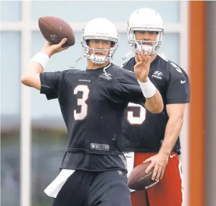  ?? MARK J. REBILAS, USA TODAY SPORTS ?? A healthy Carson Palmer, left, back from a torn ACL, makes the Cardinals an instant contender.