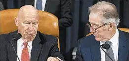  ?? MICHAEL REYNOLDS/EPA-EFE ?? House Ways and Means Committee Chairman Kevin Brady, left, confers Monday with ranking member Richard Neal, D-Mass., as the panel worked to amend the GOP tax bill.