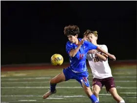  ?? ALISSA NOE — BOCOPREPS.COM ?? Centaurus’ Vincent Renton, left, battles for ball control with Windsor’s Evan Van Pelt during their game at Spangenber­g Field on Wednesday.