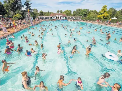  ?? Pictures: TOLGA AKMEN / LNP, ANDY LYONS / BNPS, DAVID HEDGES / SWNS, IAIN WATTS / MERCURY ?? Splashing weather for bathers cooling at Sandford Parks Lido in Cheltenham yesterday as the sun blazed down
