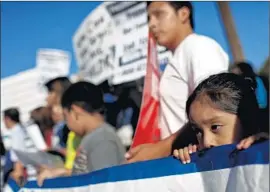  ?? Michael Robinson Chavez
Los Angeles Times ?? IMMIGRANT-RIGHTS activists have applauded the ruling against federal detention laws, but others worry it will lead to more children crossing into the U.S.