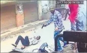  ??  ?? A CCTV grab released by police shows a man firing gunshots at Hindu rightwing activist Vipan Sharma in Bharat Nagar locality in Amritsar on Monday.