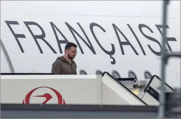  ?? Yuichi yamazaki/aFP/Getty Images north america/Tns ?? Ukraine’s President Volodymyr Zelenskyy disembarks upon his arrival at Hiroshima Airport at Mihara, Japan, on the second day of the G7 Summit Leaders’ Meeting on Saturday, May 20.