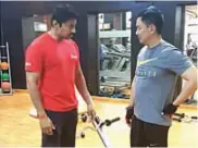  ??  ?? Rajyavardh­an Singh Rathore and Kiren Rijiju at the gym.