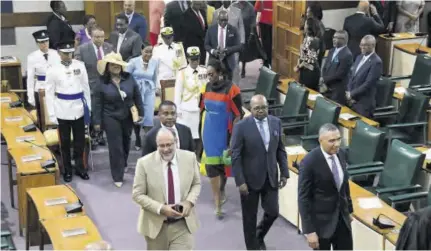  ?? (Photo: Joseph Wellington) ?? Prime Minister Andrew Holness (right) and Opposition Leader Mark Golding lead MPS into Parliament for the 2023 ceremonial opening in February.