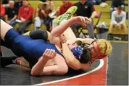  ?? AUSTIN HERTZOG - DIGITAL FIRST MEDIA ?? Boyertown’s Elijah Jones cradles Spring-Ford’s Chase Smith for back points during the final at 182 at the PAC Wrestling Championsh­ips Saturday at Boyertown.