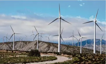  ?? Ashley Landis/Associated Press file photo ?? Wind turbines operate on March 7 in Palm Springs, Calif. According to a new report published Tuesday, last year marked the best year for new wind projects.