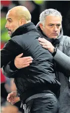  ??  ?? Pep Guardiola and United boss Jose Mourinho embrace at full-time