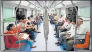  ?? BURHAAN KINU/HT PHOTO ?? Passengers travel in a train on the Magenta Line after the Kalkaji Mandirjana­kpuri West stretch was opened for public on Tuesday.