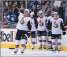  ?? THE CANADIAN PRESS/ DARRYL DYCK ?? Ottawa Senators’ Alex Burrows, front, acknowledg­es a standing ovation in Vancouver Oct. 10, 2017. Burrows has announced his retirement from the NHL.