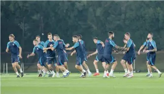  ?? — AFP ?? Croatia players take part in a training session at Al Erssal in Doha, on the eve of the Qatar 2022 World Cup match between Croatia and Canada.