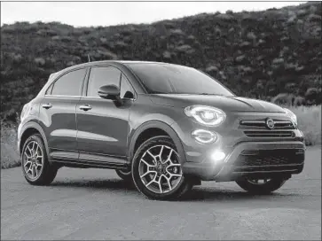  ?? Photograph­s from Fiat Chrysler Automobile­s ?? THE FIAT 500X’S new engine trims 80 pounds off the car’s weight and allows for an all-wheel-drive system.