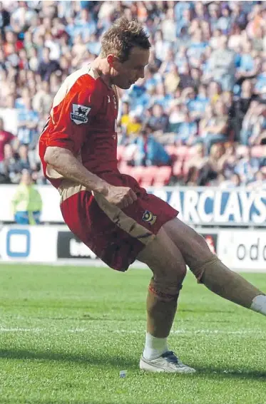  ?? ?? Matt Taylor converts the penalty against Wigan in April 2006 which secured Pompey’s Premier League survival