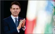  ?? ASSOCIATED PRESS ?? ITALIAN PREMIER GIUSEPPE CONTE applauds during celebratio­ns of Italy’s Republic Day in Rome Saturday.