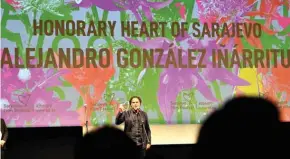  ??  ?? Mexican movie director Alejandro Gonzalez Inarritu speaks on stage, after receiving the “Honorary Heart of Sarajevo” award, during the opening night of the 25th Sarajevo Film Festival. — AFP photos