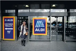  ?? /Reuters ?? Rapid expansion: German discount supermarke­t Aldi plans to increase its number of outlets in the UK to 1,200 by the year 2025, from 775 presently.