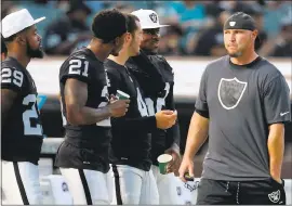  ?? RAY CHAVEZ — STAFF PHOTOGRAPH­ER ?? Oakland Raiders kicker Sebastian Janikowski walks on the sideline on Thursday.