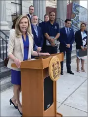  ?? PHOTO BY CARL HESSLER JR. ?? Mary C. Pugh, executive director of MCAP, addresses crowd at the “Wear Blue on the Steps” for Child Abuse Prevention Month event last April