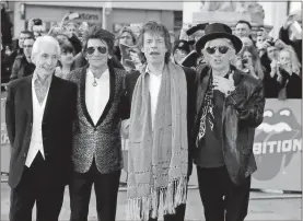  ?? Ian West/pa Wire/Zuma press/tns ?? From left, Charlie Watts, Ronnie Wood, Mick Jagger and Keith Richards of The Rolling Stones on April 4, 2016, in London. Watts has died at age 80.