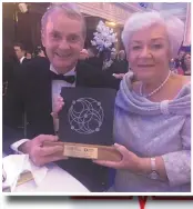  ??  ?? ABOVE:Tadhg and Anne O’Flynn pictured with the Cork Chamber SME Company of the Year Award at a gala banquet in City Hall, Cork.