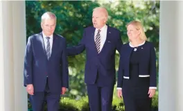  ?? ANDREW HARNIK/AP ?? President Joe Biden welcomes Finnish President Sauli Niinisto, left, and Swedish Prime Minister Magdalena Andersson to the White House last month.