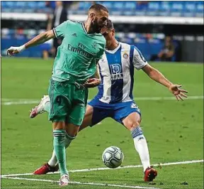  ??  ?? Décisif face à l’Espanyol avec sa talonnade, Benzema est en pleine forme.