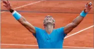  ?? AP PHOTO BY MICHEL EULER ?? Spain’s Rafael Nadal celebrates winning the men’s final match of the French Open against Austria’s Dominic Thiem in three sets 6-4, 6-3, 6-2, at the Roland Garros stadium in Paris, France, Sunday.