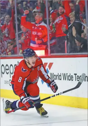  ?? ALEX BRANDON / AP ?? Washington Capitals captain Alex Ovechkin celebrates scoring the 600th goal of his NHL career in the second period of Monday’s 3-2 overtime victory over the Winnipeg Jets in Washington.