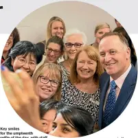  ??  ?? Key smiles for the umpteenth selfie of the day, with staff at the new Visitor Centre in Christchur­ch’s newly restored Arts Centre.