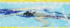  ?? — GETTY IMAGES ?? Taylor Ruck of Canada competes in the Women’s 200m Backstroke heat on Sunday in Tokyo.