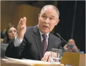  ?? J. SCOTT APPLEWHITE/ASSOCIATED PRESS ?? Scott Pruitt, President Donald Trump’s pick to head the Environmen­tal Protection Agency, testifies at his confirmati­on hearing before the Senate Environmen­t and Public Works Committee on Jan. 18.