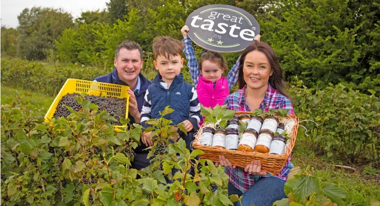  ??  ?? Sweet success: Tom and Laura Sinnott who run the family business Wexford Home Preserves pictured with their children Robbie and Lila.