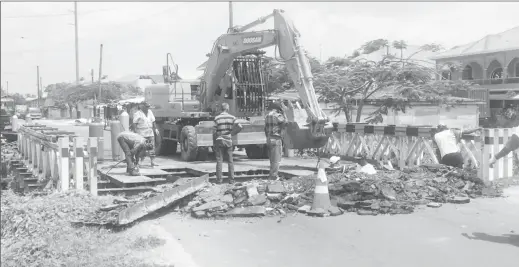  ??  ?? Work being done on the Mon Repos Bridge along the East Coast Embankment Road yesterday morning by BK Internatio­nal.