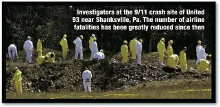  ?? ?? Investigat­ors at the 9/11 crash site of United 93 near Shanksvill­e, Pa. The number of airline fatalities has been greatly reduced since then
