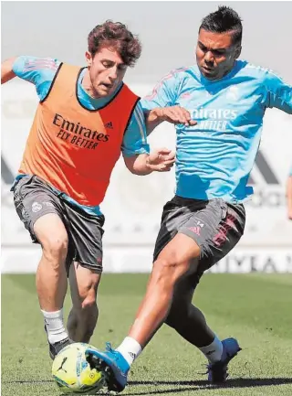  ?? ABC ?? Odriozola y Casemiro, en el entrenamie­nto de ayer