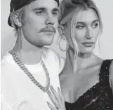  ?? REUTERS ?? Singer Justin Bieber and his wife Hailey Baldwin pose at the premiere for the documentar­y television series “Justin Bieber: Seasons” in Los Angeles, California, U.S., January 27.