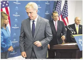  ?? EVAN VUCCI / ASSOCIATED PRESS ?? House Majority Leader Kevin McCarthy of California is the heavy Republican favorite to replace Ohioan John Boehner (second right) as House speaker. But his likely ascension will not come without a fight from House GOP conservati­ves.