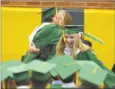  ?? Hearst Connecticu­t Media file photo ?? Trinity Catholic High School celebrates the Class of 2019’s commenceme­nt exercises. A Thursday meeting will decide the fate of the school, which has battled declining enrollment and years of deficits.
