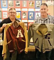  ?? (Contribute­d) ?? The Union County Sports Hall of Fame Museum has recently received a donation from the family of the late Glen Ray Hines. Hines was an All State football player for the El Dorado Wildcats and a consensus All-American selection at the University of Arkansas in 1965. He played profession­ally eight years. From left, Rod Mills, Hall of Fame President, is holding Hines’ Razorback letterman jacket and Glen Ray Hines Jr. is holding his dad’s Wildcat letterman jacket. Additional memorabili­a was also donated.