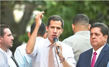  ??  ?? Guaido speaking to supporters during a gathering in Caracas. — Reuters photo