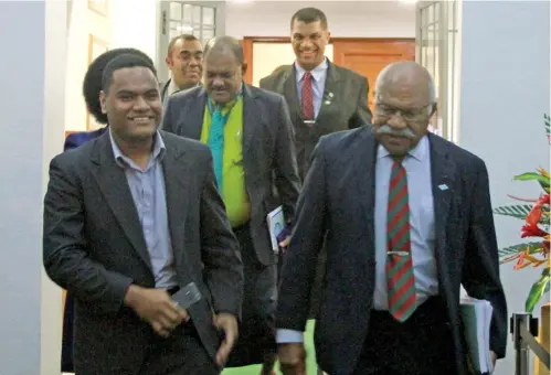  ?? Photo: Kelera Sovasiga ?? WALKOUT... Opposition leader Sitiveni Rabuka (right) outside Parliament last night after the vote.