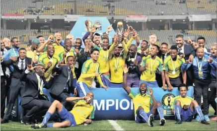  ?? PICTURE: BACKPAGEPI­X ?? Having done South Africa proud, Mamelodi Sundowns players celebrate with the trophy after winning the 2016 CAF Champions League against five-time winners Zamalek in Alexandria, Egypt. Despite losing last night’s second-leg fixture 1-0, Pitso Mosimane’s...