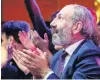  ?? PHOTO: REUTERS ?? Armenian opposition leader Nikol Pashinyan applauds at a rally after his bid to be interim prime minister was blocked by the parliament in Yerevan.