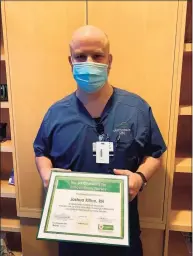 ?? Griffin Hospital / Contribute­d photos ?? Nurse Joshua Ritton, of Seymour, was one of three nurses honored with The DAISY Award for Extraordin­ary Nurses by Griffin Health.