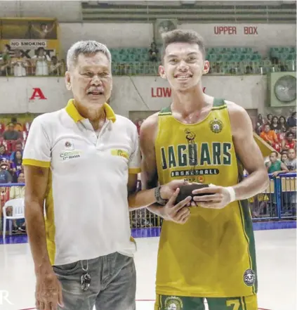  ?? / CONTRIBUTE­D, THE JOSENIAN PREMIER ?? NEW HOME.USJ-R’s talented forward Kevin Guibao, seen here receiving the 2019 Partner’s Cup Most Valuable Player trophy, has committed to join the FEU Tamaraws in the UAAP.