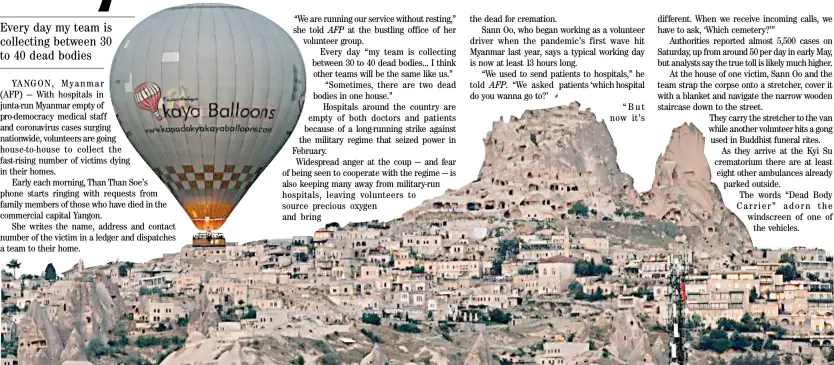  ?? MUSTAFA KAYA/XINHUA ?? SCENIC Cappadocia in Turkey gets an aerial visit from a hot-air balloon.